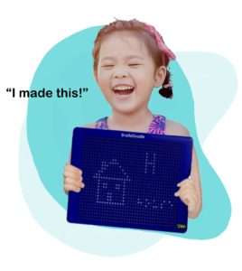 Blind girl with pony tail holding brailledoodle